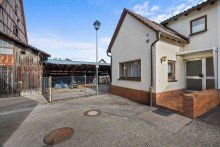Hausansicht Charmantes Reihenendhaus mit Garten, Wintergarten & unverbaubarem Blick ins Gr�ne!